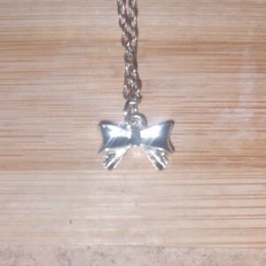 Elegant Silver Bow Pendant Necklace